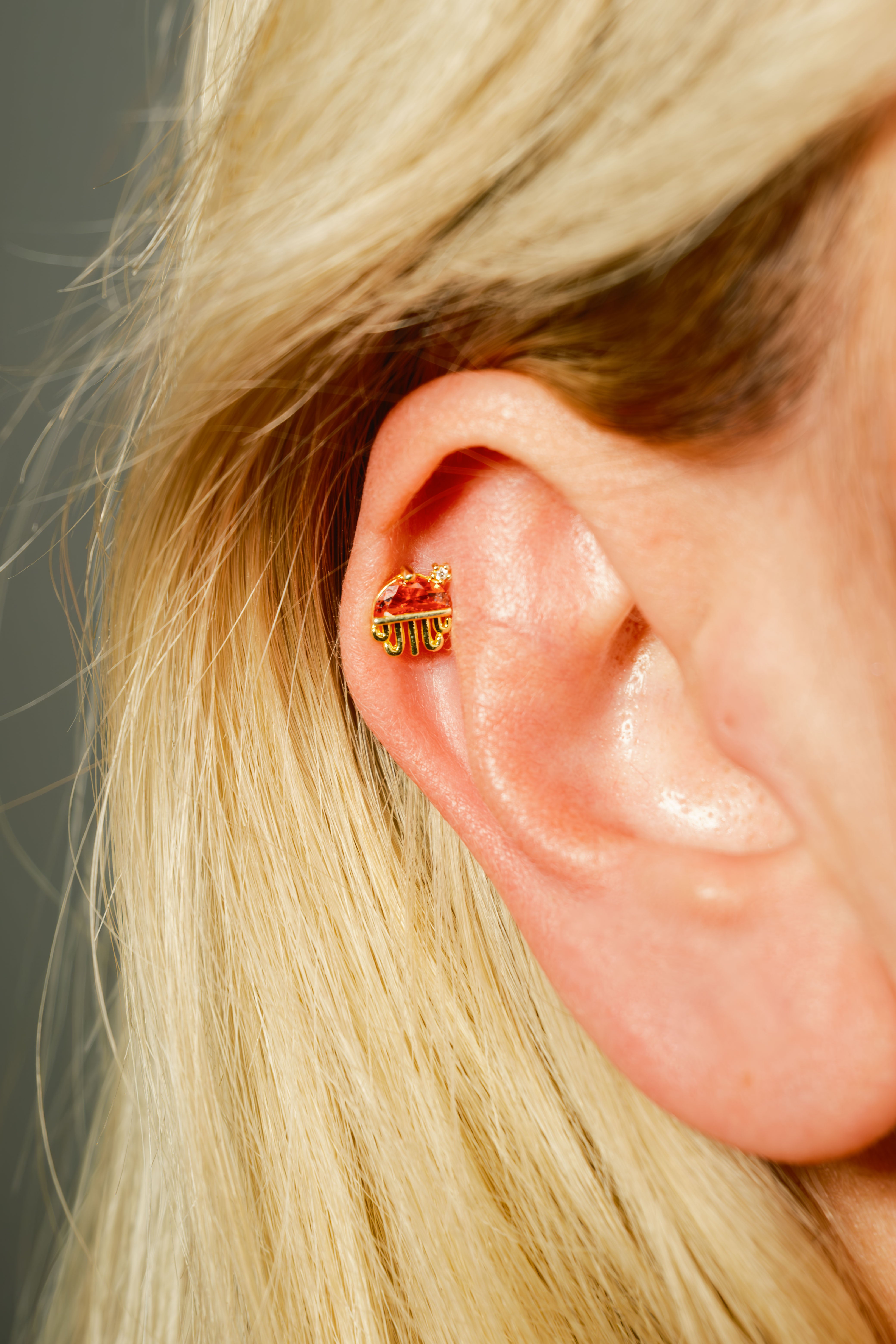 Orange Jellyfish Piercing