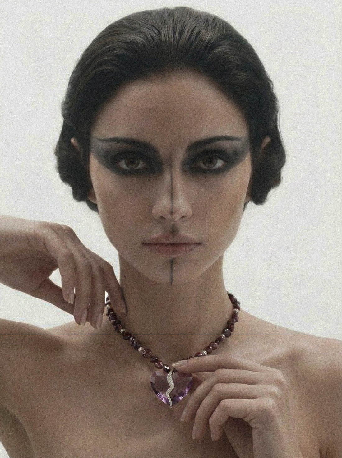 Completed Hearts Garnet Necklace worn on neck with elegant and minimal style
